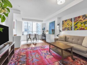 140 Simcoe St #304 furnished living and dining area