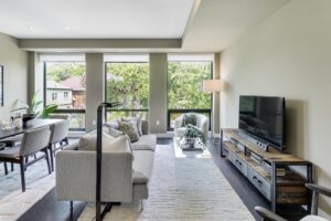 441 Jane St #410 seating area in the living room facing the large windows