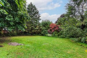 Backyard greenspace with mature trees at 12 Vistaview Blvd.