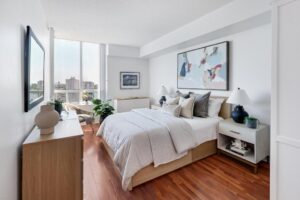 8 Covington Rd #1412 primary bedroom with floor-to-ceiling windos